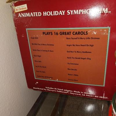ANIMATED HOLIDAY SYMPHONY, MUSICAL CAROUSEL AND A SANTA IN A TRAIN