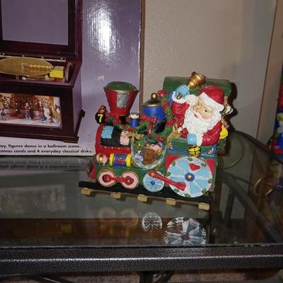ANIMATED HOLIDAY SYMPHONY, MUSICAL CAROUSEL AND A SANTA IN A TRAIN