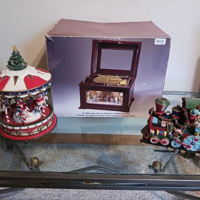 ANIMATED HOLIDAY SYMPHONY, MUSICAL CAROUSEL AND A SANTA IN A TRAIN