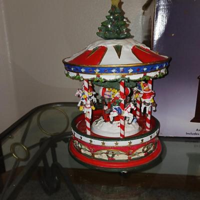 ANIMATED HOLIDAY SYMPHONY, MUSICAL CAROUSEL AND A SANTA IN A TRAIN