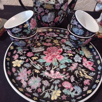ELEPHANT BOOKENDS AND CHINA TEA SET