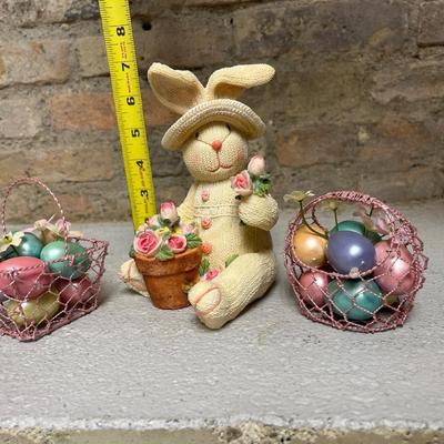 Sale Photo Thumbnail #108: Happy Easter hanging sign, egg snow globe with original box, glittery Easter decor, blue bunny basket, “knitted” bunny figurine, painting eggs figurine and bunny & chick figurine