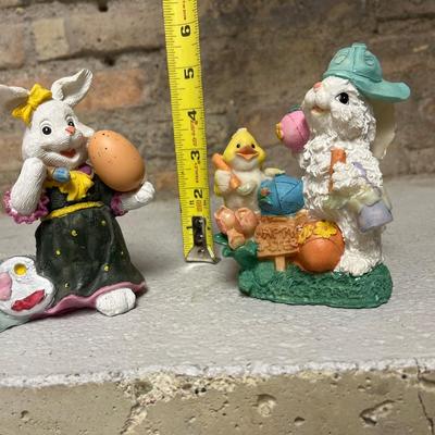 Sale Photo Thumbnail #109: Happy Easter hanging sign, egg snow globe with original box, glittery Easter decor, blue bunny basket, “knitted” bunny figurine, painting eggs figurine and bunny & chick figurine