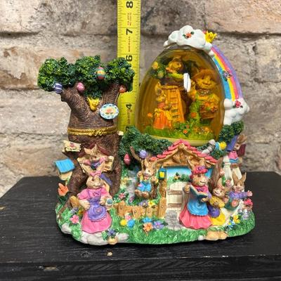 Sale Photo Thumbnail #104: Happy Easter hanging sign, egg snow globe with original box, glittery Easter decor, blue bunny basket, “knitted” bunny figurine, painting eggs figurine and bunny & chick figurine