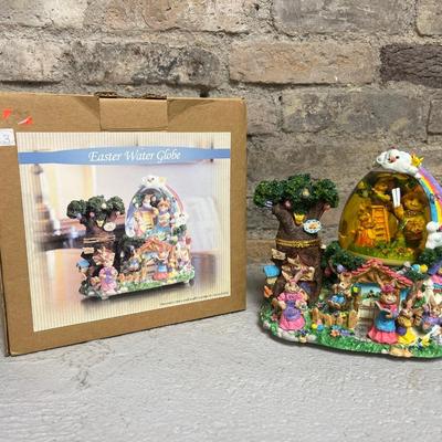 Sale Photo Thumbnail #105: Happy Easter hanging sign, egg snow globe with original box, glittery Easter decor, blue bunny basket, “knitted” bunny figurine, painting eggs figurine and bunny & chick figurine