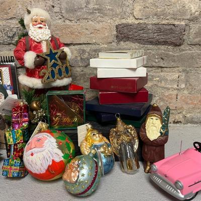Sale Photo Thumbnail #121: Too many great things to list individually, but this lot includes Radko, Belsnickle, Gorham, Spode, Orrefors, White House commemorative ornaments, angel ornaments, a cast iron Father Christmas bank and so much more! Definitely worth a look through all 24 