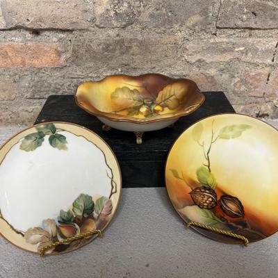 Sale Photo Thumbnail #154: Beautiful acorn relief footed bowl and two different styles of 6 1/2” plates. Small chip on one plate