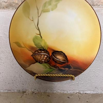 Sale Photo Thumbnail #157: Beautiful acorn relief footed bowl and two different styles of 6 1/2” plates. Small chip on one plate