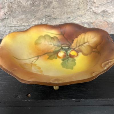 Sale Photo Thumbnail #155: Beautiful acorn relief footed bowl and two different styles of 6 1/2” plates. Small chip on one plate
