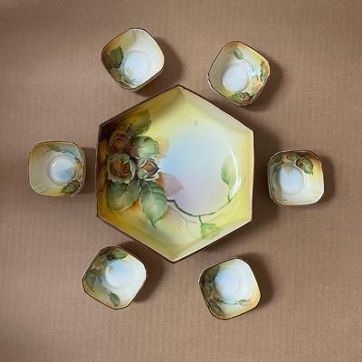Sale Photo Thumbnail #184: Stunning nut set with footed master dish and six individual nut dishes