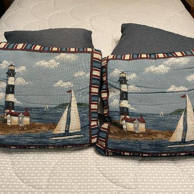 Four Nautical-Themed Throw Pillows with Lighthouse Design