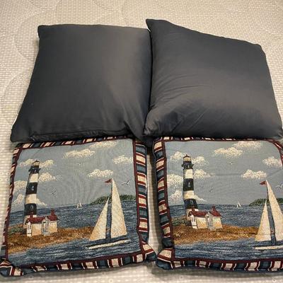 Four Nautical-Themed Throw Pillows with Lighthouse Design