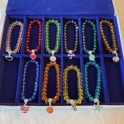 Beaded Charm Bracelets in Various Colors with Decorative Charms