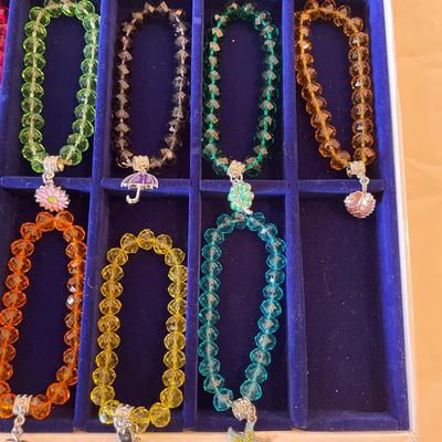 Beaded Charm Bracelets in Various Colors with Decorative Charms