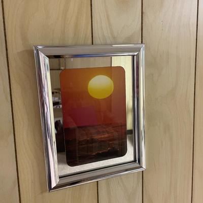 Framed Sunset-Themed Prints in Silver-Toned Frames