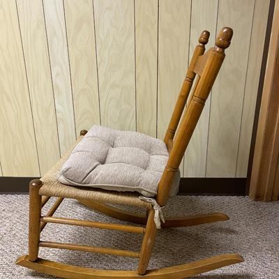 Wooden Rocking Chair with Woven Seat and Beige Cushion