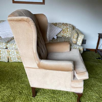 Beige Tufted Wingback Chair with Queen Anne Style Legs