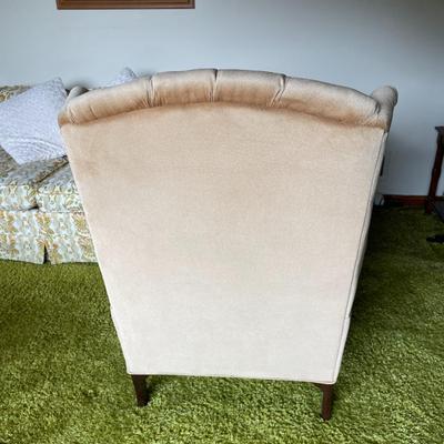 Beige Tufted Wingback Chair with Queen Anne Style Legs