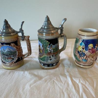 Three German Beer Steins with Pewter Lids