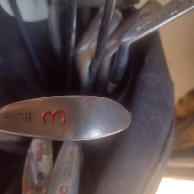 Set of Wilson Golf Clubs with a Callaway 3 Wood includes Club Bag and Airline Case