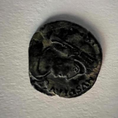 Bronze Roman coin circa 370 AD. 1 inch