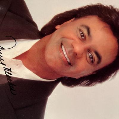 Johnny Mathis facsimile signed photo. 8x10 inches