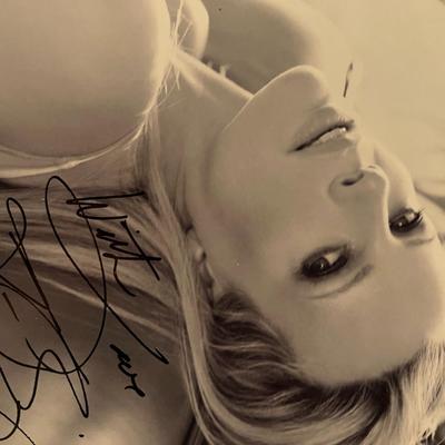Kim Basinger facsimile signed photo. 8x10 inches