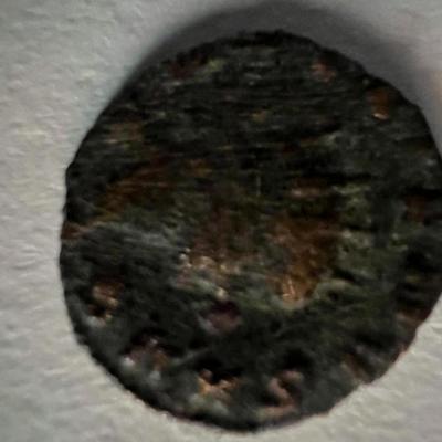 Bronze Roman coin circa 370 AD. 1 inch