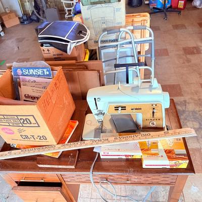 Lot 3: Singer Sewing Machine, Supplies,Tv stand & more