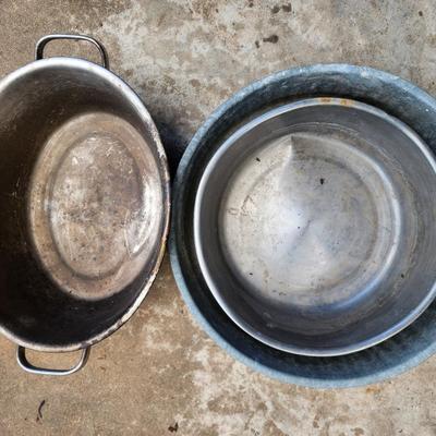 Sale Photo Thumbnail #112: 2 Round metal bowls and one large oval stainless steell bowl