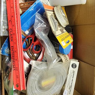 Sale Photo Thumbnail #234: Box of various home repair parts including hand vac, rifle bore cleaner, trowels, Lift-Master garage door remotes, door stops, etc.
