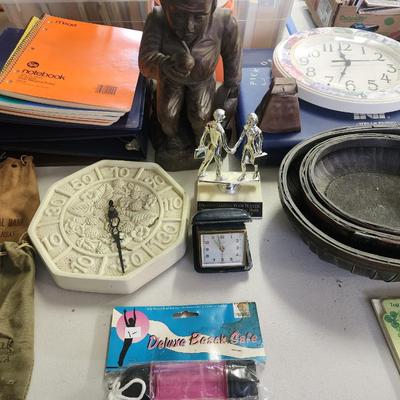 Sale Photo Thumbnail #285: Lot of 3 ring binders, spiral notebooks, clocks, woven bowls (3), carved wood statue, stadium cushion