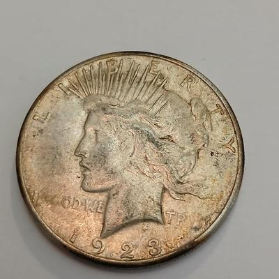 Two 1923 Peace Silver Dollars