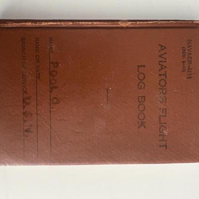 Odie Pool signed aviators flight log book