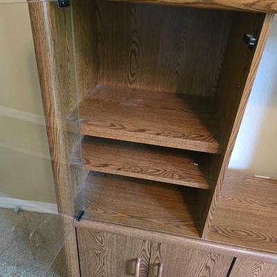 Oak Finish Entertainment Center with Glass Cabinet & Nice flat screen Philips TV