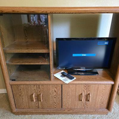 Oak Finish Entertainment Center with Glass Cabinet & Nice flat screen Philips TV