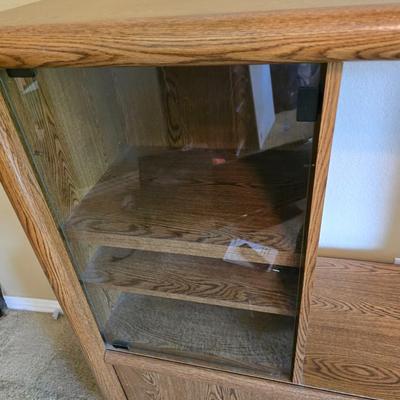 Oak Finish Entertainment Center with Glass Cabinet & Nice flat screen Philips TV