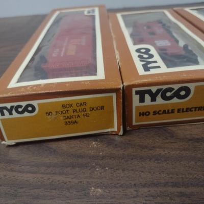 Set of Three Tyco HO Scale Rail Cars Includes Santa Fe 7240 Caboose, El Capitan Box Car and Virginian Hopper