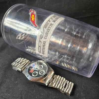 Sale Photo Thumbnail #442: This auction lot is for a few Corvette Items.  This includes a Corvette Tervis cup - used, and a 2010 Corvette Man's Watch, also used - will need a new battery.  The silver case has a few scratches but the face is good.