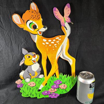 Sale Photo Thumbnail #449: This auction lot is for some Vintage Disney Bambi Plaques.  This is a sweet set of 4 Bambi characters made from Masonite wall plaques.  Great for any child's room.  Bambi's tail has a crease/fold but still very stable (see photo)  The other pieces are in 
