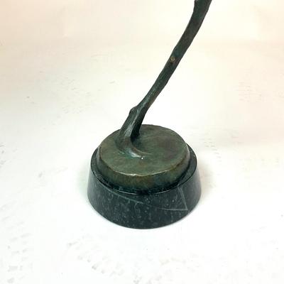 Sale Photo Thumbnail #97: Made out of bronze and polychrome.Hornbill depicted with an egg in its beak, its talons gripping a curved branch; on black round stepped plinth base.  
Measurements:
Bird is 14.5" height, 6.5" diameter for base, total height is 28" height
Valued @ $2500.0