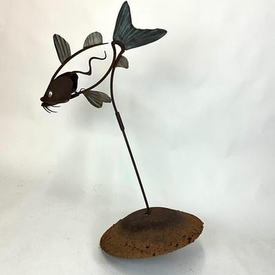 Sale Photo Thumbnail #150: Measurements:
46" Height, 24" Width base
31" Catfish Length 
Base is lightly rusted from being buried in the ground 
Value $300-$400

Base was outside, underside has rusted