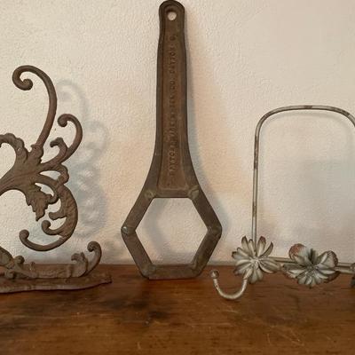 Metal decor including wrench, bracket and picture frame