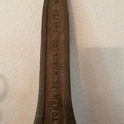 Metal decor including wrench, bracket and picture frame