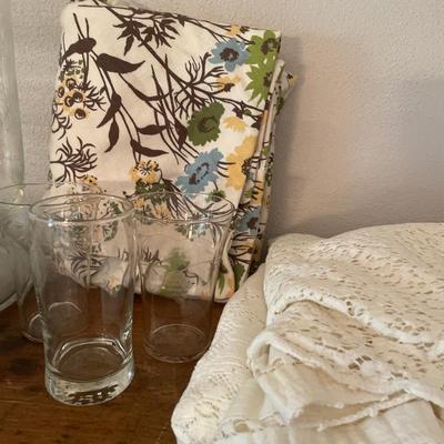 Clear glass glasses, large decor and table cloths