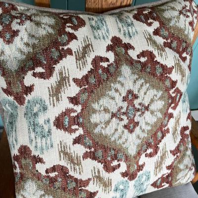 Vintage rocking chair with pillow