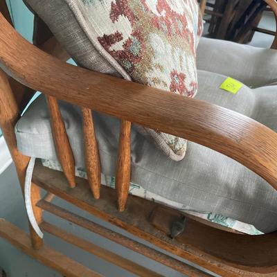 Vintage rocking chair with pillow