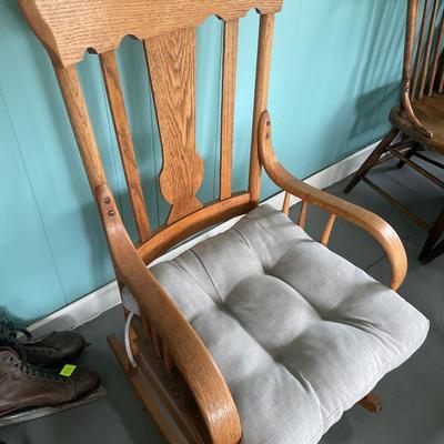 Vintage rocking chair with pillow