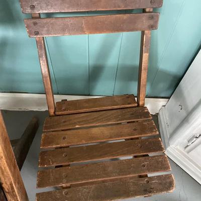 2 wood folding chairs