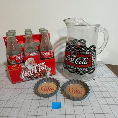 Coca-Cola Collectible Set – 1999 Santa Pack Bottles, Pitcher & Bottle Cap Coasters